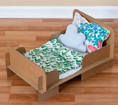 I also made a bed out of a small cereal box. Official Disney Baby Store Shopdisney Cardboard Bed Diy Dollhouse Furniture Diy Cardboard