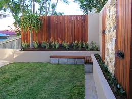 Inner City Brisbane Courtyard Surrounded By Merbau Decking Screens Drystone Feature Wall A Landscaping Retaining Walls Large Backyard Landscaping Fence Design