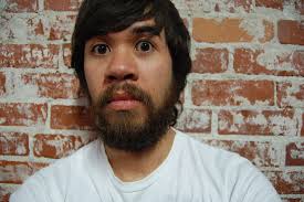 usual self portrait with brick wall