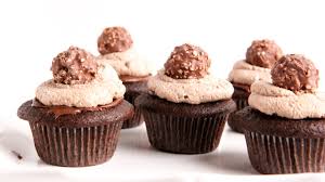 It wouldn't be easter without sweet bread to dip into coffee first thing easter morning and stirred into chamomile last thing on easter night. Ferrero Rocher Cupcake Recipe Laura Vitale Laura In The Kitchen Episode Justrightfood Com