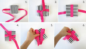 4th, wrap the ribbon into 8 shape; 3 Beautiful Ways Of How To Tie A Bow With Ribbon