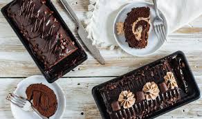 Add yellow cake mix to the batter gives it a hint of cake flavor paired with buttercream glaze! Goldilocks Vs Red Ribbon Round Two Which Chocolate Roll Deserves A Spot On The Table Pepper Ph Recipes Taste Tests And Cooking Tips From Manila Philippines