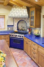 Kitchen backsplash with decorative mural using angeles talavera mexican tile. Spanish Style Kitchen Tile Novocom Top