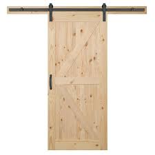 Masonite 36 In X 84 In K Bar Knotty Pine Wood Interior Sliding Barn Door Slab With Hardware Kit 17439 The Home Depot Interior Sliding Barn Doors Barn Door Wood Interiors