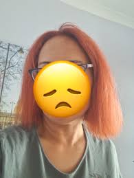 Her goal is to go as red as possible. This is her colour just now , I have  an idea but could anyone tell me how you would achieve this. I'm in
