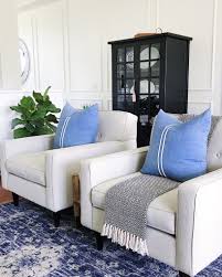 Modern Black And Blue Living Room How To Choose A Design Style That Feels Right For You Jane At Home In 2020 Blue And White Living Room Living Room White Living Room Turquoise