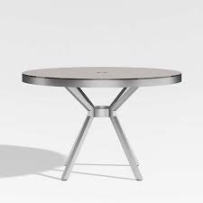 Merge formal and contemporary elements with a table featuring rich walnut and cherry surrounding framing and chocolate leather seats. Glass Dining Tables Crate And Barrel