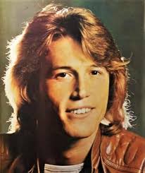 Andy Gibb (seen here with Victoria Principal) died