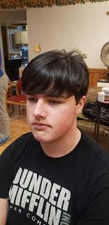 This is my grandson Michael. Broke my heart to cut all of this hair off.  Anyone that knows me knows I like long hair. Still so handsome! 😁❤