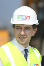 Omnishambles': Call for Harris to be fired over children's hospital overrun  but he says he 'behaved appropriately'