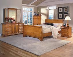 Honey Creek Sleigh Bedroom Suite Light Oak Finish Country Classic Style Raised Panel Door And Oak Bedroom Furniture Bedroom Design Oak Bedroom Furniture Sets