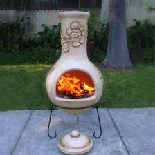 This chiminea comes complete with a fire poker and a log grate. Chiminea Fireplace Lowes Novocom Top