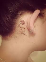 It's shorthand in my mom's handwriting and it says 'get busy living' with the pink ribbon for my breast cancer survivorship. 17 Tattoo Behind Ear Ideas Tattoos Cute Tattoos Body Art Tattoos