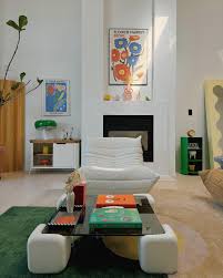 I rearranged my furniture again. The best part of this layout is having a  dedicated living area where we can enjoy the city skyline and cozy seating.  No more eating meals on