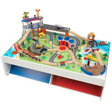 The highlight of the journey is the imposing mountain with arched passageways so vehicles can travel through. Kidkraft 79 Piece Wooden Plastic Railway Express Train Table Set 18012
