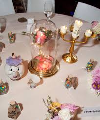 Pull inspiration from alice in wonderland and use dark stationery with bold, bright accents. Disney Themed Wedding Table Centerpieces Off 78 Buy