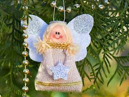 Tie off, and leave some string to hang the angel. 20 Beautiful Angel Christmas Decorations Lovetoknow