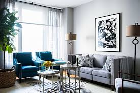 Modern And Chic Living Room Grey Couch Gorgeous Blue Chairs With Chic Zebra Print Rug Modern Living Room Design Modern Trendy Living Rooms Funky Home Decor