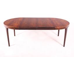 Round expandable dining table is solve the problem of organizing lunches or dinners for many people, and not wastes space when not in use. Danish Extendable Round Dining Table In Rosewood 153413