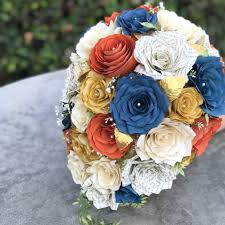 Maybe you would like to learn more about one of these? Teardrop Bridal Bouquet Shown In Burnt Orange Navy Blue Champagne Gold And Book Page Paper Flowers