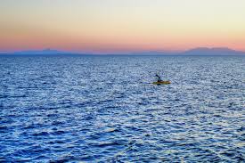 Lonely Man In Row Boat On The Sea At Sunset Stock Photo Image Of Lost Golden 107054306