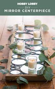 Its plain, reflective surface is broken up only by a brief bevel around its edge. Diy Mirror Centerpiece Mirror Centerpiece Fall Decor Diy Mirror Crafts