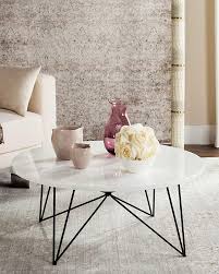 The right coffee table often acts as the uniting factor for all the other furniture in your living room. Safavieh Maris Coffee Table Coffee Table Marble Round Coffee Table Coffee Table White