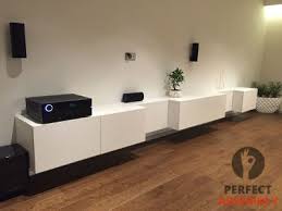 Uppleva ormo openings in the tv stand with a pencil, mark the three. Besta Cabinet Installation Flat Pack Specialists Nyc