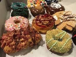 A Photo Of Donuts From Psycho Donuts In Campbell California Including The Canadian Morning Squeal Meal Key Li Psycho Donuts Lunch Restaurants California Food