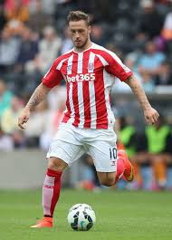 Marko arnautovic of stoke city runs with the ball under pressure from johnny hunt and connor jennings of wrexham during the fa cup third round match between stoke city and wrexham at britannia. Pinterest