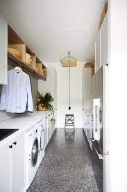 And you don't need to build custom cabinets and shelves to have extra surfaces for folding. 75 Beautiful Concrete Floor Laundry Room Pictures Ideas March 2021 Houzz