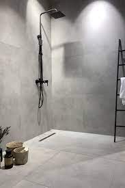 de badkamertrend van het moment minimalisme ten top badkamer inrichting badkamer grijze tegels badkamer vloertegels