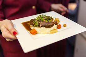 Braised Lamb Shank Appears As One Of The Business Class Main Dishes Courtesy Qatar Airways Food Cuisine Qatar Airways