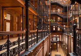 The legendary building that needed ghostly approval before being built. Inside Los Angeles Bradbury Building Travel Caffeine