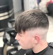 Medium Dipped Skin Fade With Fringe International Hair Salon Facebook
