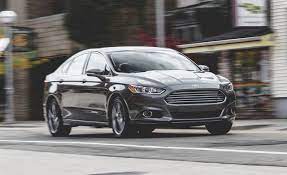 The new for fusion looks awesome, the grill reminds me of an aston martin, ford has really improved the looks of their cars, i have to hand it to them, even the new taurus looks sweet! Ford Fusion Titanium 2 0l Ecoboost Awd Test 8211 Review 8211 Car And Driver