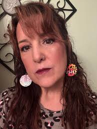 Applying lip stain with darker color