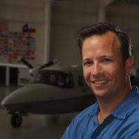 At MacDill Air Force Base (AFB), Florida (FL), retired AIRMAN Roy Lang  stands in front of a B-17 Flying Fortress bomber, similar to the one he  flew as a Navigator in 1944