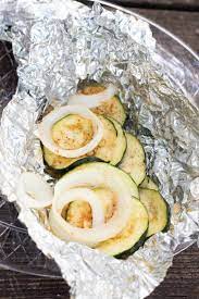 Drizzle the zucchini with 2 tablespoons olive oil and season with 1/2 teaspoon kosher salt and 1/2 teaspoon black pepper. Campfire Zucchini Foil Packets This Ole Mom