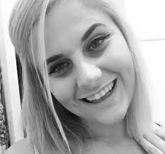 Woman changing flat tyre dies after being hit by minibus