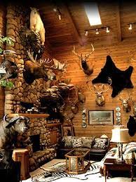 In a trophy room, you don't want a single mount to cast a shadow over the rest of your trophies. Taxidermy Minnesota Wildlife Art Minnesota World Class Taxidermy Mounts Mn Taxidermy Decor Hunting Room Trophy Rooms