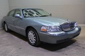 Image result for Light Ice Blue 2005 Town Car