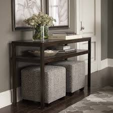 Small Scale Ottoman Available In Fabric And Features Walnut Finish On The Legs Ottoman Decor Living Room Sofa Cube Ottoman