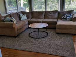 The ultimate area rug size and placement guide. Rug Under A Sectional Couch