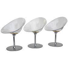 These beautifully upholstered dining chairs create a warm, inviting seating option with a unique style that will add an aura of sophistication to your dining room with its alluring comfort and luxurious style. Philippe Starck For Kartell Clear Lucite Eros Swivel Italian Chairs Set Of 3 For Sale At 1stdibs