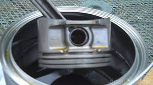Dissolving Carbon Buildup From Pistons Cleaning Piston Ring Grooves Engine Rebuild Compression Piston Ring Engine Rebuild Engineering
