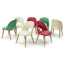 Set Of Seven Chairs On Conical Tapered Legs With Square Seats And Arched Backrests The Chairs Are Upholstered With Faux Leather In Chair Club Chairs Upholster