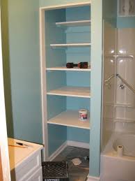 Looks Like The Shelves I Just Built I Like How They Hid The Supports By Coloring It The Same As The Wall Bathroom Closet Bathroom Shelves Bathroom Shelf Decor