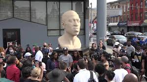 In late june 2021, a statue of george floyd in new york city was vandalized with a label representing a white nationalist group. Usa George Floyd Statue Unveiled In Brooklyn For Juneteeth Video Ruptly