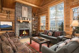 Cabin 12 has two rooms, a shower bathroom, a mini refrigerator and microwave, a work desk, a flat screen television, a small porch, and complimentary fiber optic internet. Jackson Hole Wyoming Cabin Rentals Getaways All Cabins